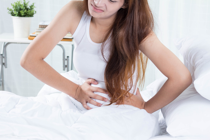 Woman in pain from urinary tract infection